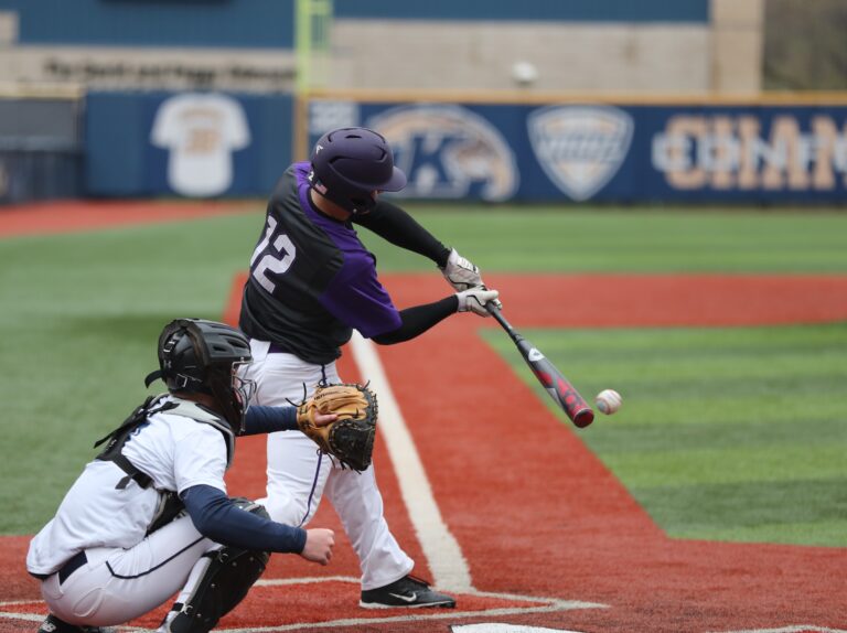 Baseball player getting a hit