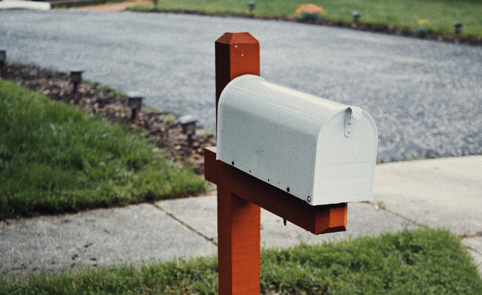 A mailbox with stand.
