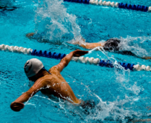 A swimmer practicing in the pool.